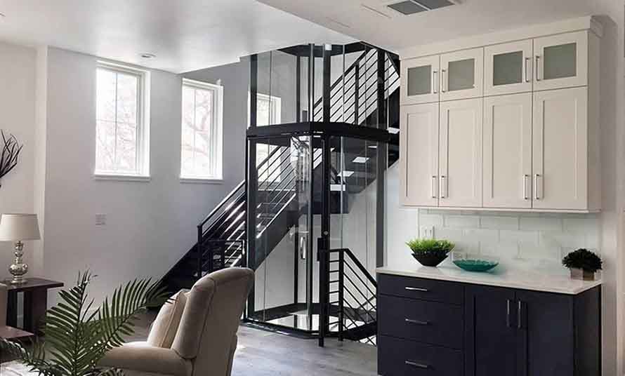 sàn kính cường lực thang máy